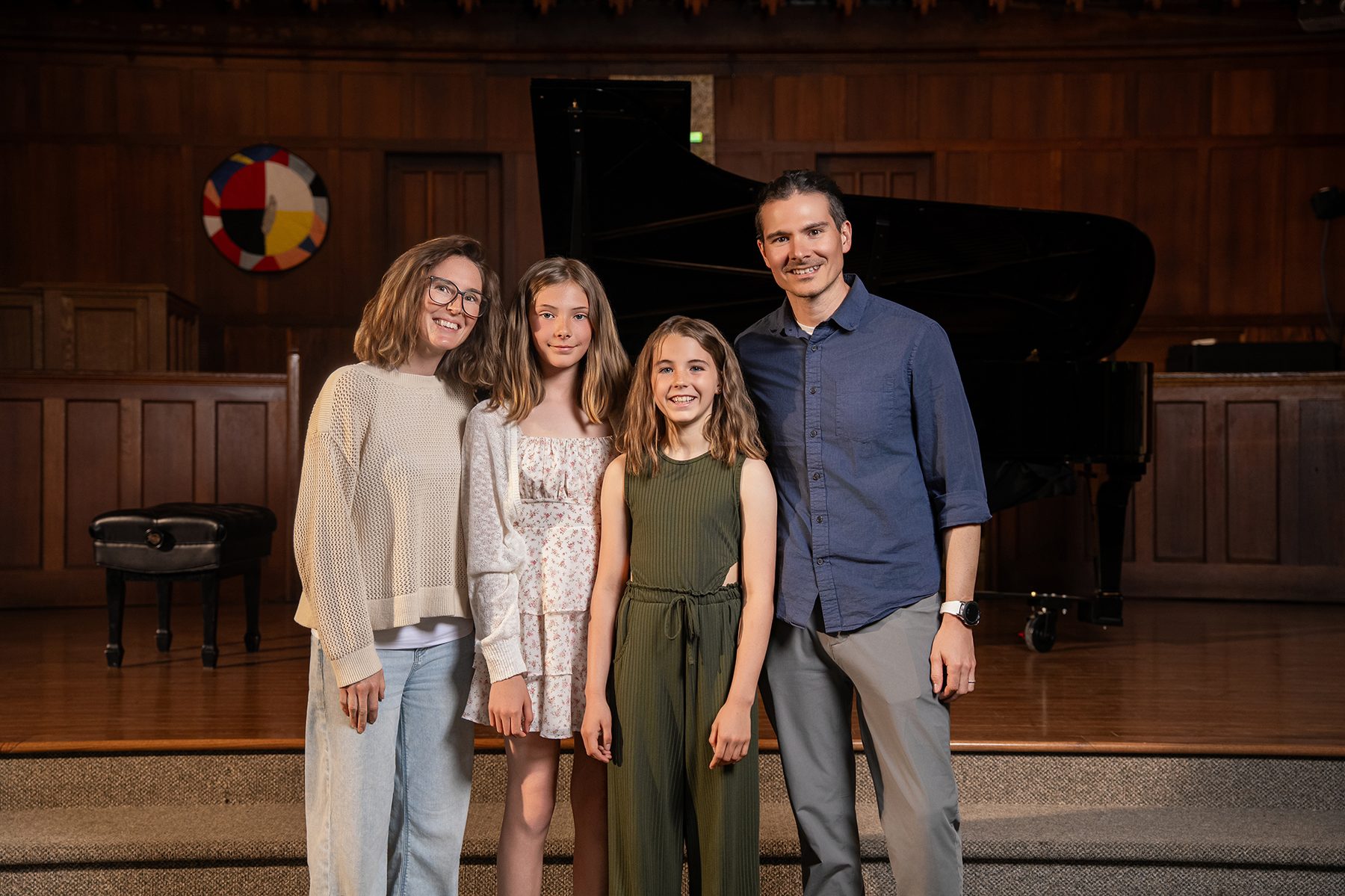 A smiling family at a Piano Place recital in Ottawa