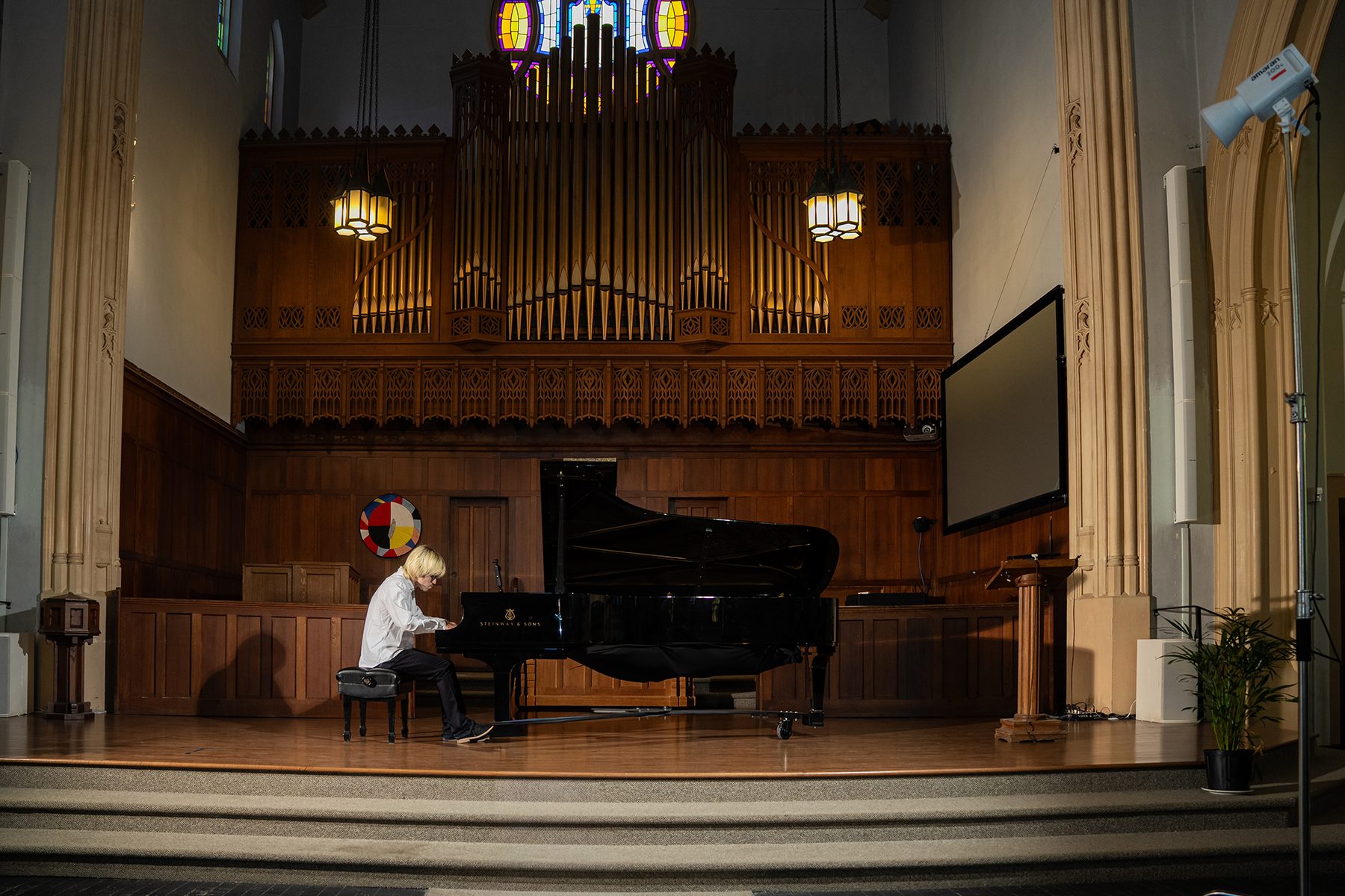 Piano Place instructor rehearsing on a Steinway
